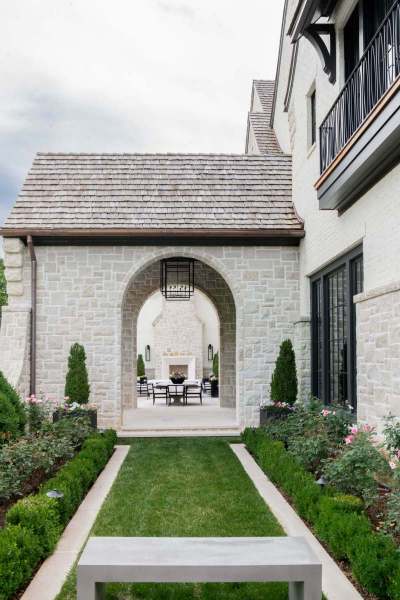 River Song Haven - Arched Passage to Outdoor Courtyard – Castle Homes