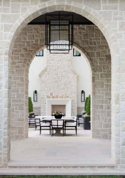 River Song Haven - Arched Passage to Outdoor Courtyard – Castle Homes