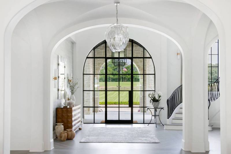 River Song Haven - Arched Foyer with Glass Door – Castle Homes