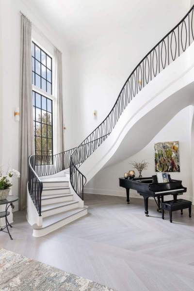 River Song Haven - Grand Staircase and Foyer – Castle Homes