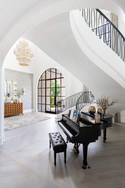 River Song Haven - Grand Staircase and Arch Doorway – Castle Homes
