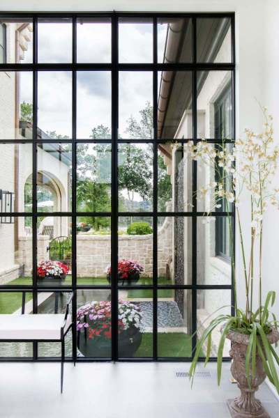 River Song Haven - Glass Wall Courtyard View – Castle Homes