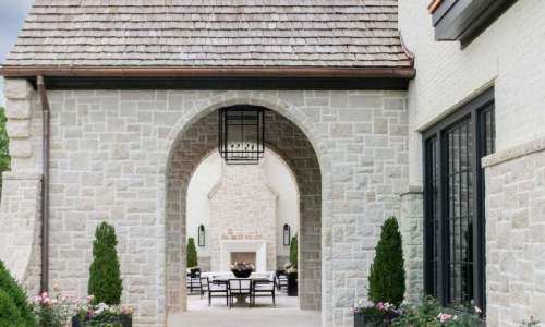River Song Haven - Arched Passage to Outdoor Courtyard – Castle Homes