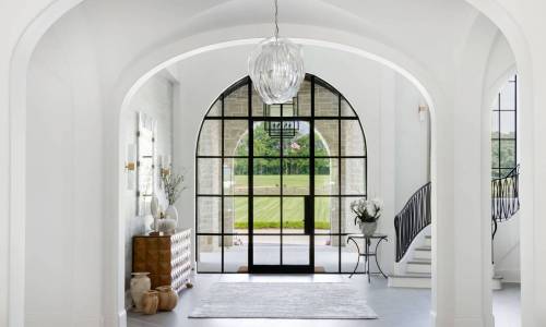 River Song Haven - Arched Foyer with Glass Door – Castle Homes