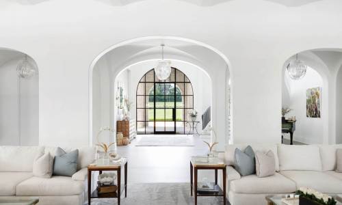 River Song Haven - Arched Hallway and Living Room View – Castle Homes”