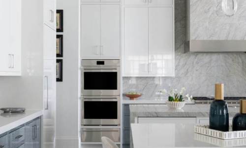 River Song Haven - Bright Marble Kitchen with Island Seating – Castle Homes