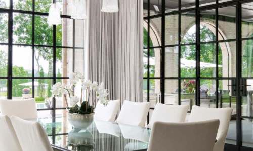 River Song Haven - Glass-Enclosed Dining Room – Castle Homes