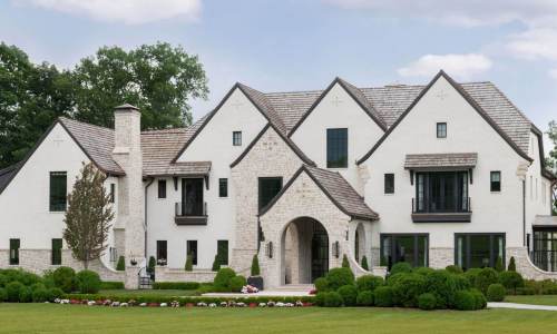 River Song Haven - Front Facade with Stone and Steel Accents – Castle Homes