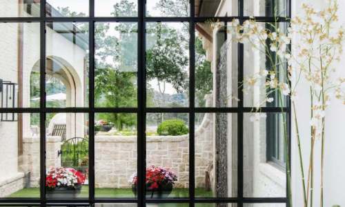 River Song Haven - Glass Wall Courtyard View – Castle Homes