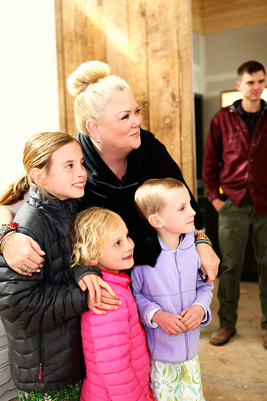 After a tour by Castle Homes Superintendent Josh Smith, Fontanel’s Laura Lacy, St. Jude Ambassador Mae McNally were serenaded by Steven Whitson at the Southern Living Idea House. (Photo by Sarah Lee)