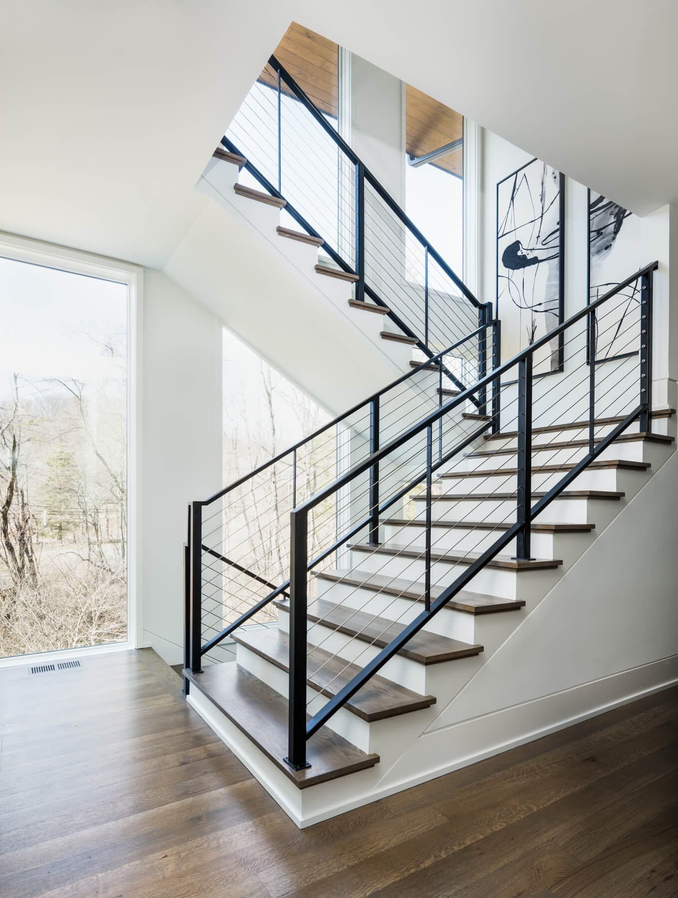 Contemporary home staircase by Castle Homes